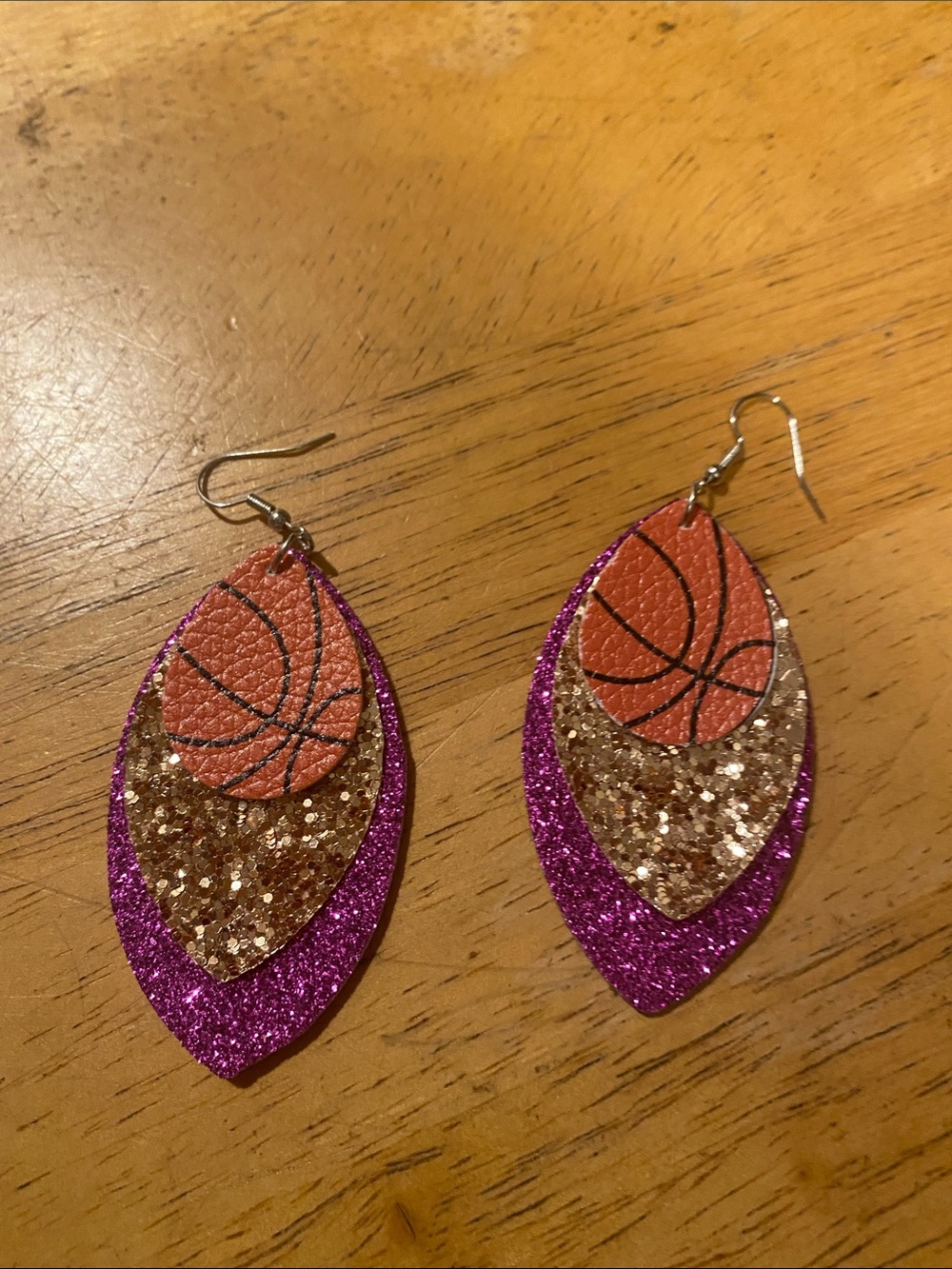 Gold and purple basketball earrings